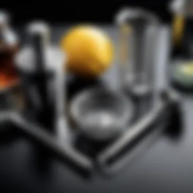 A close-up of a bartender's tools including shaker and strainer